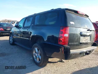 2012 Chevrolet Suburban LTZ with VIN 1GNSKKE75CR133445, listed as a IAAI auction lot 41590306 with 203,592 mi miles. Bid and sale history available at carsss.com. Image 3.