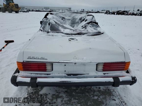 1986 Mercedes-Benz 560 SL z VIN WDBBA48D8GA042178, wystawiony jako Copart lot #41809525 z przebiegiem 80 788 mil mil oraz Szkody całkowita. Historia ofert i sprzedaży dostępna na DreamBid. Obrazek 6.