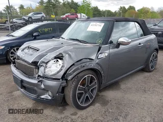 2010 MINI Convertible S with VIN WMWMS3C59ATY51392, listed as a IAAI auction lot 42192716 with 117,628 mi miles and . Bid and sale history available at DreamBid. Image 2.