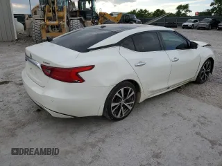 2018 Nissan Maxima Platinum z VIN 1N4AA6AP6JC404541, wystawiony jako Copart lot #58216865 z przebiegiem 85 673 mil mil oraz Szkoda całkowita • Salvage title. Historia ofert i sprzedaży dostępna na DreamBid. Obrazek 3.