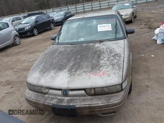1996 Oldsmobile Cutlass Supreme S z VIN 1G3WH52M9TF377685, wystawiony jako IAAI lot #41496775 z przebiegiem 197 366 mil mil oraz . Historia ofert i sprzedaży dostępna na DreamBid. Obrazek 6.