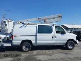 2011 Ford Econoline Cargo Commercial with VIN 1FTSE3EL6BDB29886, listed as a IAAI auction lot 41958479 with 211,787 mi miles. Bid and sale history available at carsss.com. Image 14.