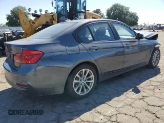 2018 BMW 3 Series 320i with VIN WBA8A9C51JAD26901, listed as a Copart auction lot 52609285 with 36,344 mi miles and Salvage Title. Bid and sale history available at carsss.com. Image 3.