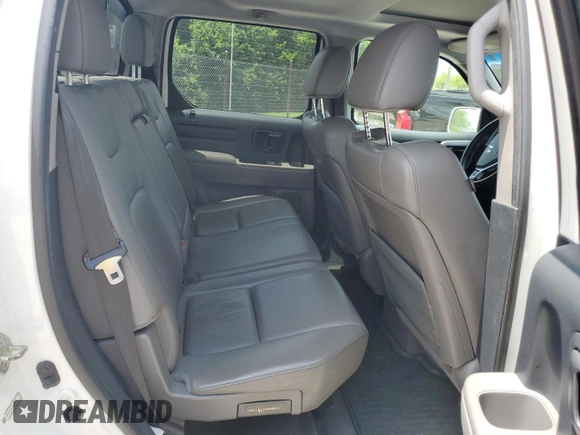 2012 Honda Ridgeline RTL with VIN 5FPYK1F56CB002709, listed as a Copart auction lot 62642495 with 116,416 mi miles and Salvage title. Bid and sale history available at DreamBid. Image 10.