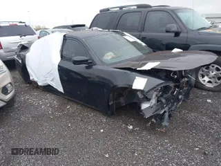 2015 Dodge Charger SE with VIN 2C3CDXBG9FH776852, listed as a IAAI auction lot 41841472 with Not Provided miles and . Bid and sale history available at carsss.com. Image 1.