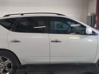 2003 Nissan Murano SL with VIN JN8AZ08W13W214133, listed as a IAAI auction lot 42057504 with 163,751 mi miles and . Bid and sale history available at DreamBid. Image 13.