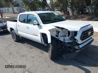 2022 Toyota Tacoma SR5 z VIN 3TMAZ5CN0NM194709, wystawiony jako IAAI lot #42416803 z przebiegiem 44 736 mil mil oraz . Historia ofert i sprzedaży dostępna na DreamBid. Obrazek 1.