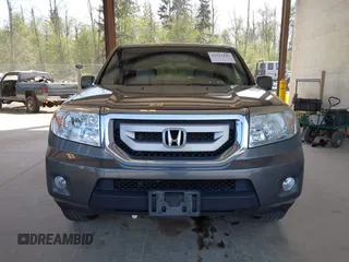 2011 Honda Pilot EX-L with VIN 5FNYF4H56BB503089, listed as a IAAI auction lot 42127543 with 144,227 mi miles. Bid and sale history available at carsss.com. Image 12.