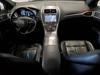 2017 Lincoln MKZ Reserve z VIN 3LN6L5E98HR610676, wystawiony jako Copart lot #61957055 z przebiegiem 56 246 mil mil oraz Szkoda całkowita • Salvage title. Historia ofert i sprzedaży dostępna na DreamBid. Obrazek 8.