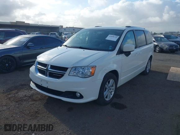 2013 Dodge Grand Caravan Crew with VIN 2C4RDGDG4DR606263, listed as a IAAI auction lot 41898351 with 127,044 mi miles and . Bid and sale history available at DreamBid. Image 17.