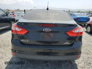 2012 Ford Focus SE with VIN 1FAHP3F22CL372232, listed as a Copart auction lot 59637645 with 134,337 mi miles and Salvage title. Bid and sale history available at DreamBid. Image 6.