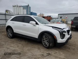 2020 Cadillac XT4 AWD Sport with VIN 1GYFZFR44LF047925, listed as a Copart auction lot 86426674 with 71,928 mi miles and Salvage title. Bid and sale history available at DreamBid. Image 4.