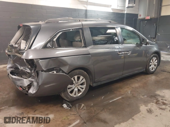 2016 Honda Odyssey EX-L with VIN 5FNRL5H61GB138100, listed as a IAAI auction lot 41548666 with 127,780 mi miles. Bid and sale history available at carsss.com. Image 4.