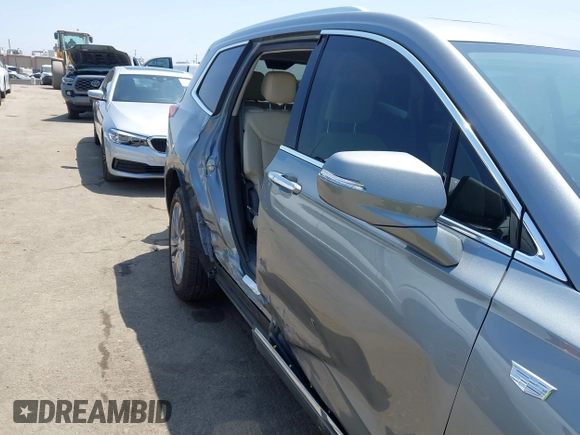 2023 Cadillac XT6 FWD Premium Luxury with VIN 1GYKPCRS6PZ163018, listed as a IAAI auction lot 42437403 with 21,366 mi miles and . Bid and sale history available at DreamBid. Image 6.