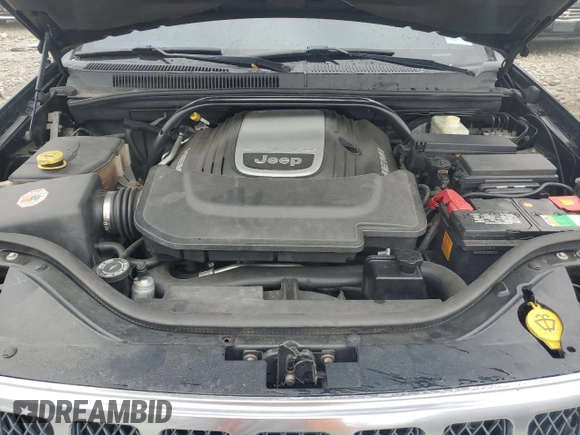 2007 Jeep Grand Cherokee Overland with VIN 1J8HR68227C651830, listed as a Copart auction lot 62403725 with 147,827 mi miles and Salvage title. Bid and sale history available at DreamBid. Image 11.