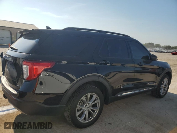 2023 Ford Explorer XLT with VIN 1FMSK8DH7PGB08372, listed as a Copart auction lot 62395205 with 63,257 mi miles and Salvage title. Bid and sale history available at DreamBid. Image 3.