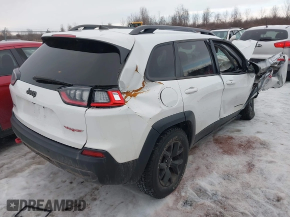 2019 Jeep Cherokee Trailhawk Elite with VIN 1C4PJMBX0KD362287, listed as a IAAI auction lot 41656425 with 87,641 mi miles. Bid and sale history available at carsss.com. Image 4.