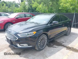 2017 Ford Fusion Titanium with VIN 3FA6P0D92HR252476, listed as a IAAI auction lot 40176942 with 88,818 mi miles and . Bid and sale history available at DreamBid. Image 2.