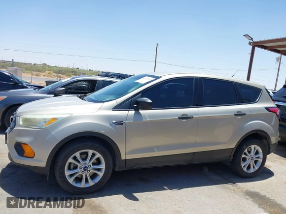 2017 Ford Escape S with VIN 1FMCU0F73HUE07591, listed as a IAAI auction lot 42422092 with 101,959 mi miles and . Bid and sale history available at DreamBid. Image 14.