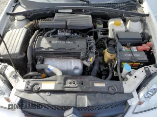 2006 Suzuki Forenza z VIN KL5JD86Z86K256922, wystawiony jako Copart lot #42201125 z przebiegiem 39 043 mil mil oraz Tytuł czysty. Historia ofert i sprzedaży dostępna na DreamBid. Obrazek 11.