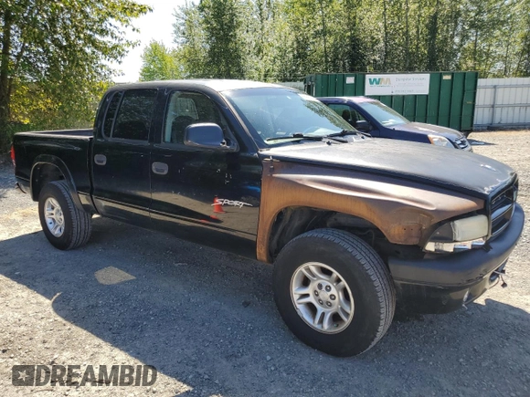 2001 Dodge Dakota Sport z VIN 1B7GG2AN81S113605, wystawiony jako Copart lot #58990065 z przebiegiem 243 919 mil mil oraz Czysty tytuł • Clean title. Historia ofert i sprzedaży dostępna na DreamBid. Obrazek 4.