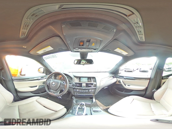 2015 BMW X4 xDrive35i with VIN 5UXXW5C59F0E87517, listed as a Copart auction lot 59604445 with 185,064 mi miles and Salvage title. Bid and sale history available at DreamBid. Image 15.