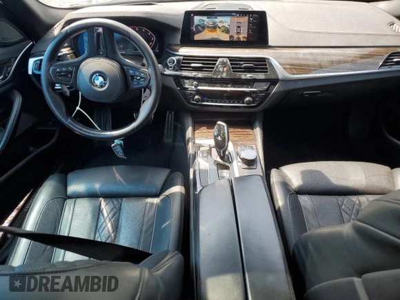 2020 BMW 5 Series M550i xDrive with VIN WBAJS7C06LCD12779, listed as a Copart auction lot 61136215 with 81,286 mi miles and Salvage title. Bid and sale history available at DreamBid. Image 8.