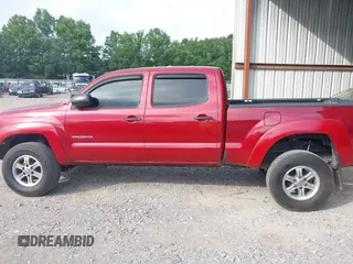 2014 Toyota Tacoma with VIN 3TMMU4FN8EM068048, listed as a IAAI auction lot 42633506 with 126,339 mi miles and . Bid and sale history available at DreamBid. Image 14.