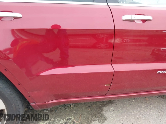2015 Jeep Grand Cherokee High Altitude with VIN 1C4RJECG7FC884942, listed as a IAAI auction lot 41852796 with 110,454 mi miles. Bid and sale history available at carsss.com. Image 17.