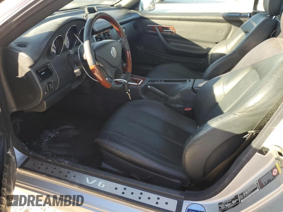 2004 Mercedes-Benz SLK-Class with VIN WDBKK65FX4F300214, listed as a Copart auction lot 82160974 with 75,964 mi miles and Salvage Title. Bid and sale history available at carsss.com. Image 7.