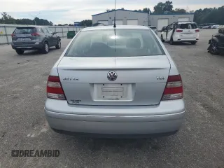 2004 Volkswagen Jetta GL with VIN 3VWRR69M34M108439, listed as a Copart auction lot 74029704 with 296,984 mi miles and Salvage title. Bid and sale history available at DreamBid. Image 6.