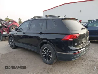 2023 Volkswagen Tiguan S z VIN 3VVRB7AX7PM036833, wystawiony jako IAAI lot #41827631 z przebiegiem 43 383 mil mil oraz . Historia ofert i sprzedaży dostępna na DreamBid. Obrazek 14.