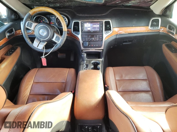 2013 Jeep Grand Cherokee Overland with VIN 1C4RJFCG0DC607214, listed as a Copart auction lot 43672575 with 188,026 mi miles and Salvage Title. Bid and sale history available at carsss.com. Image 8.