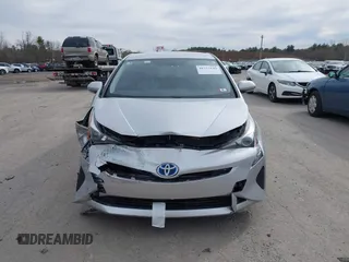 2016 Toyota Prius Two with VIN JTDKBRFUXG3023523, listed as a IAAI auction lot 41757143 with 124,144 mi miles. Bid and sale history available at carsss.com. Image 12.