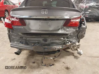 2016 Honda Accord Touring with VIN 1HGCR3F92GA029435, listed as a IAAI auction lot 42180794 with 132,658 mi miles and . Bid and sale history available at DreamBid. Image 21.