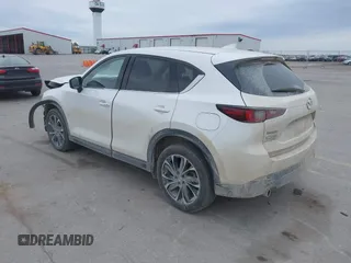 2023 Mazda CX-5 2.5 S Premium Plus Package with VIN JM3KFBEMXP0103278, listed as a IAAI auction lot 40954999 with 100,798 mi miles. Bid and sale history available at carsss.com. Image 3.