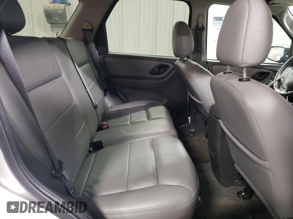 2005 Ford Escape XLT z VIN 1FMYU93145KA20050, wystawiony jako Copart lot #76794024 z przebiegiem 98 559 mil mil oraz Szkoda całkowita • Salvage title. Historia ofert i sprzedaży dostępna na DreamBid. Obrazek 10.