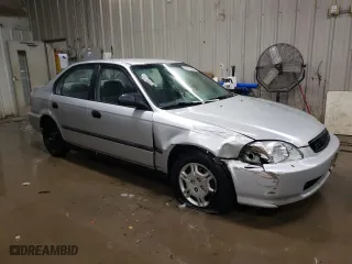 1997 Honda Civic DX with VIN 1HGEJ6624VL021651, listed as a Copart auction lot 86190384 with 135,159 mi miles and Salvage Title. Bid and sale history available at carsss.com. Image 4.