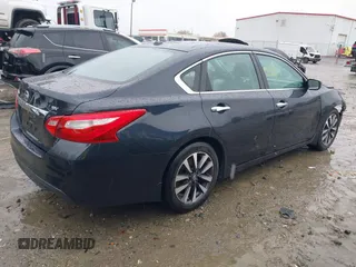 2016 Nissan Altima SR with VIN 1N4AL3AP0GC165604, listed as a IAAI auction lot 41755313 with 201,692 mi miles and . Bid and sale history available at DreamBid. Image 4.