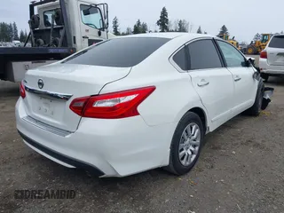 2016 Nissan Altima S z VIN 1N4AL3AP0GN385278, wystawiony jako IAAI lot #41771066 z przebiegiem 98 983 mil mil oraz . Historia ofert i sprzedaży dostępna na DreamBid. Obrazek 4.