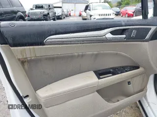 2020 Ford Fusion SE z VIN 3FA6P0LU2LR219671, wystawiony jako IAAI lot #41996821 z przebiegiem Nie podano mil oraz . Historia ofert i sprzedaży dostępna na DreamBid. Obrazek 13.