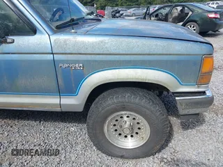 1990 Ford Ranger with VIN 1FTCR11T4LUB52586, listed as a IAAI auction lot 40423489 with 24,823 mi miles and . Bid and sale history available at DreamBid. Image 12.