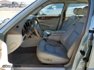 2000 Jaguar XJ with VIN SAJDA14C1YLF10459, listed as a Copart auction lot 65583394 with 113,333 mi miles and Salvage Title. Bid and sale history available at carsss.com. Image 7.