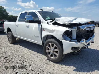 2023 Ram 2500 Laramie with VIN 3C6UR5FL2PG514919, listed as a Copart auction lot 59411155 with 23,679 mi miles and Salvage title. Bid and sale history available at DreamBid. Image 4.