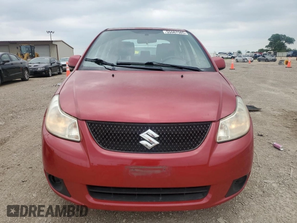 2012 Suzuki SX4 LE z VIN JS2YC5A33C6304897, wystawiony jako Copart lot #55567505 z przebiegiem 42 968 mil mil oraz Szkoda całkowita • Salvage title. Historia ofert i sprzedaży dostępna na DreamBid. Obrazek 5.