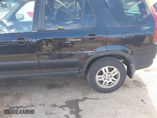 2003 Honda CR-V EX with VIN SHSRD78833U137690, listed as a IAAI auction lot 41831360 with 208,795 mi miles. Bid and sale history available at carsss.com. Image 6.