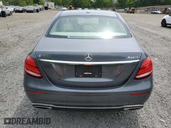 2018 Mercedes-Benz E 300 with VIN WDDZF4KBXJA337966, listed as a Copart auction lot 58718355 with 54,264 mi miles and Salvage title. Bid and sale history available at DreamBid. Image 6.