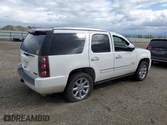2014 GMC Yukon Denali with VIN 1GKS2EEF1ER212412, listed as a Copart auction lot 50954565 with 115,964 mi miles and Salvage Title. Bid and sale history available at carsss.com. Image 3.