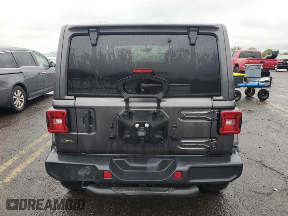2020 Jeep Wrangler Unlimited Sahara Altitude with VIN 1C4HJXEM5LW293741, listed as a Copart auction lot 58801565 with 97,460 mi miles and Salvage title. Bid and sale history available at DreamBid. Image 6.