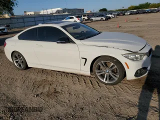 2015 BMW 4 Series 428i with VIN WBA3N3C59FK233053, listed as a Copart auction lot 52651415 with 165,218 mi miles and Salvage Title. Bid and sale history available at DreamBid. Image 4.